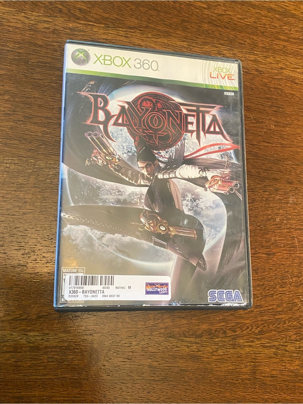 ⁠Bayonetta (Microsoft Xbox 360, 2010) Ex-Rental Hollywood Video CIB Complete